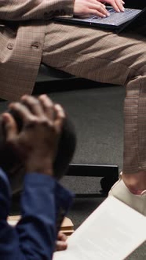 Two People Work in an Office Environment