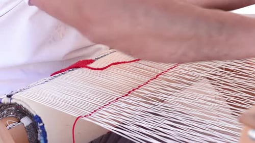 Red Yarn Threading in Handloom Weaving Process