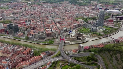 Aerial Footage Showing City of Bilbao with Guggenheim Museum Nervion River and Iconic La Salve