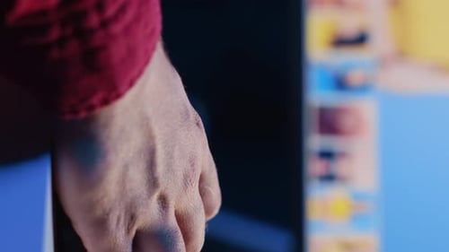 Vertical Video Photographer Using Advanced Photo Editing Software Close Up Shot on Monitor