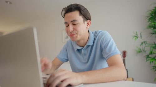 Young Adult Working Tired on Computer