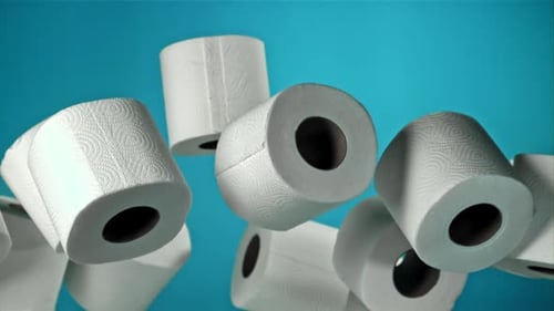 Floating Toilet Paper Rolls on Blue Background