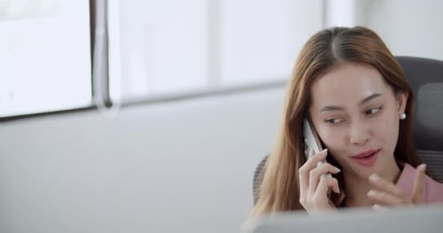 Businesswoman phone call in bright modern office - professional communication