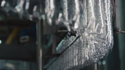 Production Line of Plastic Bottles at Bottling Plant