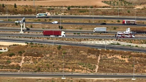 Highway traffic on multiple highways roads with traffic on all roads, Aerial footage
