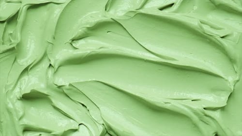 Abstract Swirling Cream Footage with Changing Colors