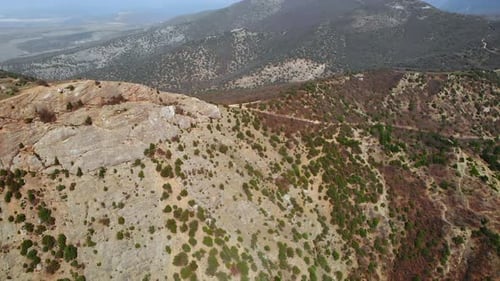 Aerial View Flying Over Hilly Landscape and Mountains Media