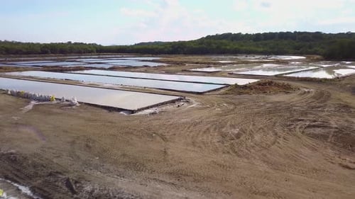 A gorgeous aerial drone shot of saltworks (a place where salt is produced commercially), with rectan
