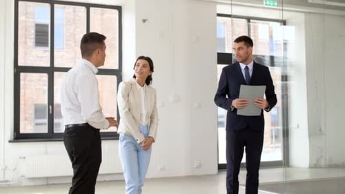 Real Estate Business, Sale and People Concept - Realtor with Folder Showing
