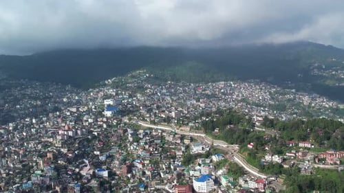 Aerial view of Hill town which shows deforestation.