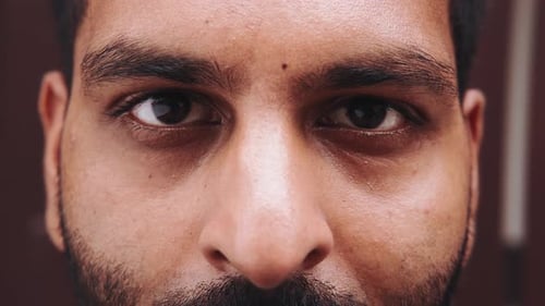 Close Up of a Smiling Bearded Man's Face