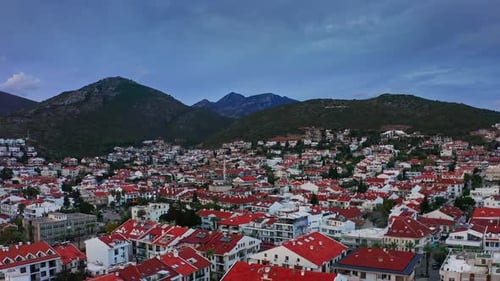 Flying over seaside city downtown and mosque at Aegean Turkey region, Datça town, Reşadiye peninsula