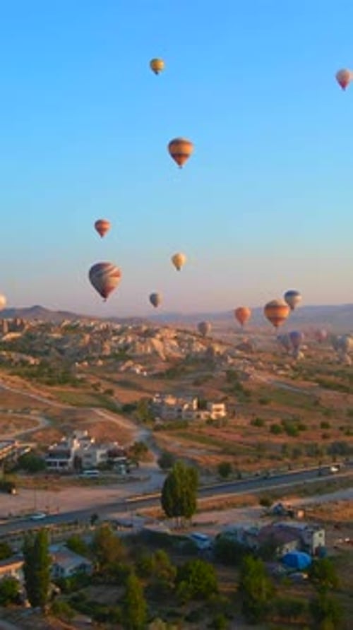 Vertical Video In This Aerial Video the Skies Above Cappadocia Turkey Come Alive with a Kaleidoscope