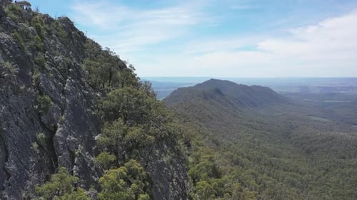 Rugged and fractured rock flakes of Sugarloaf peak in Victoria, AUS