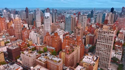 Numerous red-brick buildings in the cityscape of New York, USA.
