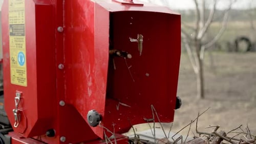 Industrial Wood Shredder Machine Producing Wood Chips at Backyard Garden Shredder Working
