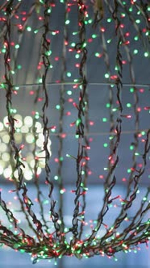 Festive Spherical Light Decoration with Red and Green Lights