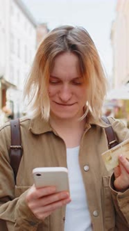 Woman Using Credit Bank Card and Smartphone While Transferring Money Purchases Online Shopping