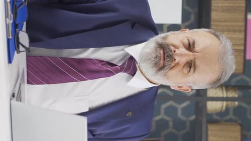 Professional Man Discussing Business in a Workplace