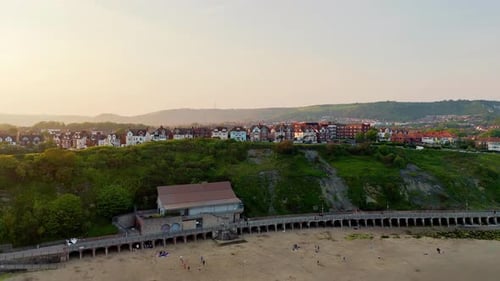 Aerial view, seaside town beach, residents leisure, visitor walkway