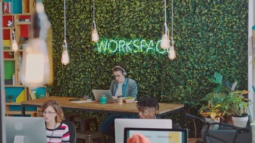 Modern Office with People Working at Desks