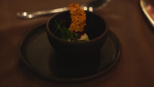 Artful Small Dish with Cracker and Greens