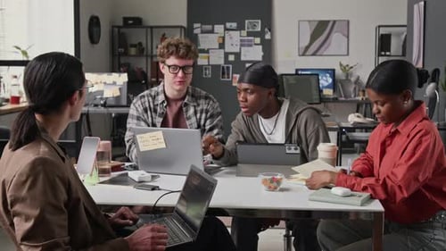 Multiethnic Programmers Collaborating on Software Development in Office