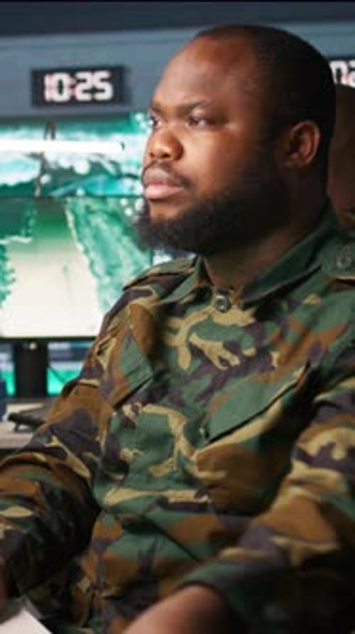 Vertical Video Counterintelligence Specialist in Military HQ Base Gathering Information