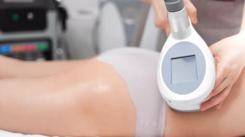 Process of Lymphatic Drainage Massage and Anticellulite Treatment By Apparatus in SPA Salon Closeup