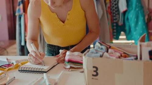 Woman Work on DIY Hobby Sewing Project in Studio