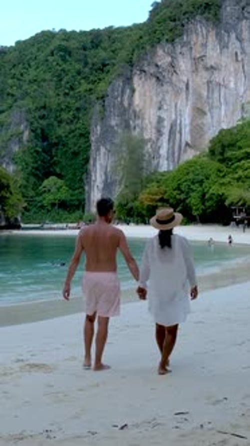 Couple Men and Women on a Tropical White Beach in Thailand Koh Hong Island Krabi