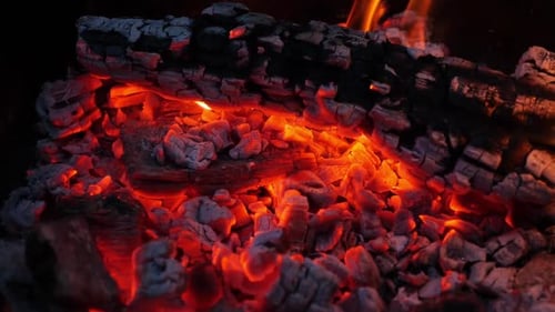 Glowing Embers Closeup Capturing the Subtle Flickers of Residual Heat
