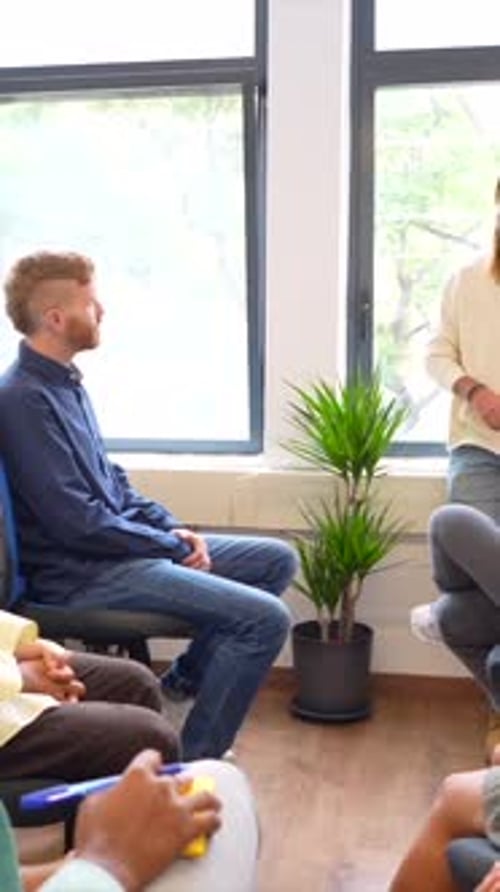Young Adults Gathering for Office Presentation