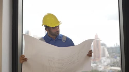 Engineer is working at tower.