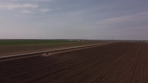 Tractor Plow Field Prepares Land For Planting Crop Aerial Top View