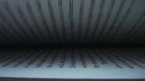 Macro Leafing Book Pages. Closeup Turning Pages of Book. Detailed View