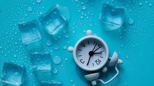 Ice Cubes and a Clock on a Blue Background