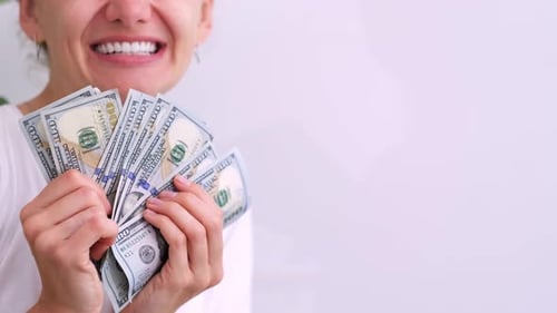 Excited Smiling Woman Showing Cash Money 1000 American Dollars Banknotes Hands with Money Close Up