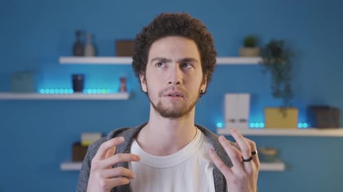 Young man doing self-calculations in his mind.