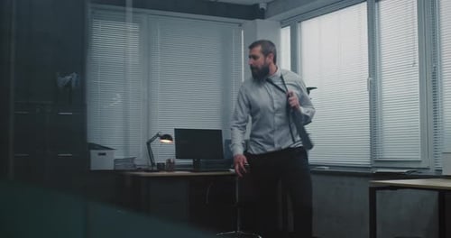 Aggressive Businessman Loses His Temper Throws Things Yells and Destroys Office Room