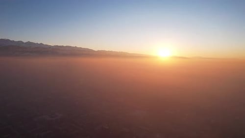 Epic Gray Smog is Visible at Sunset Over the City