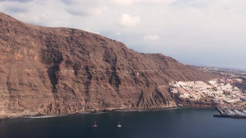 Hight Mountain Cliffs Los Gigantes and Tourist Resort on Tenerife Island