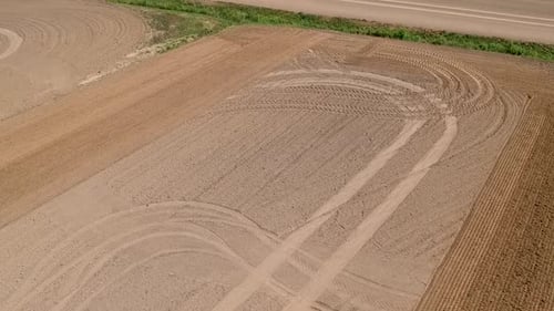 Tractor at Work Preparing the Field for the Upcoming Planting Season