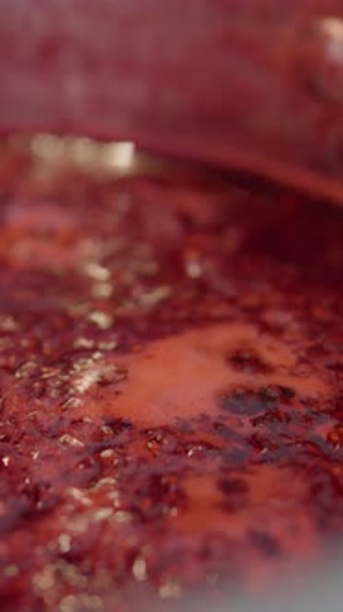 Close up of a Red Berry Sauce Simmering