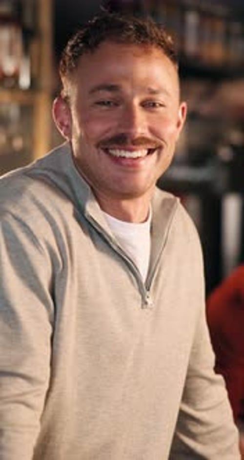Bartender, face or man in pub with happiness, career pride or ambition as beverage server