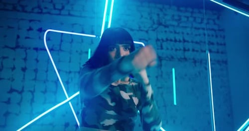 Cyberpunk Lady Moves Fists Practicing Boxing Movements