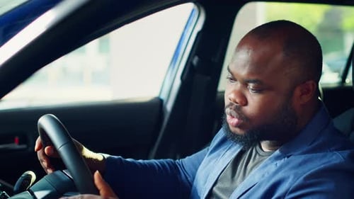 Customer Inspecting Vehicle Interior During Test Drive