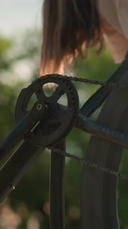 Bicycle chain turns during summertime outside