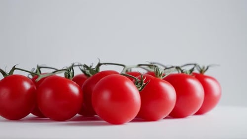Close Up of Small Red Cherry Tomatoes Rotation