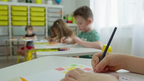 Young Children Learning and Studying in Classroom